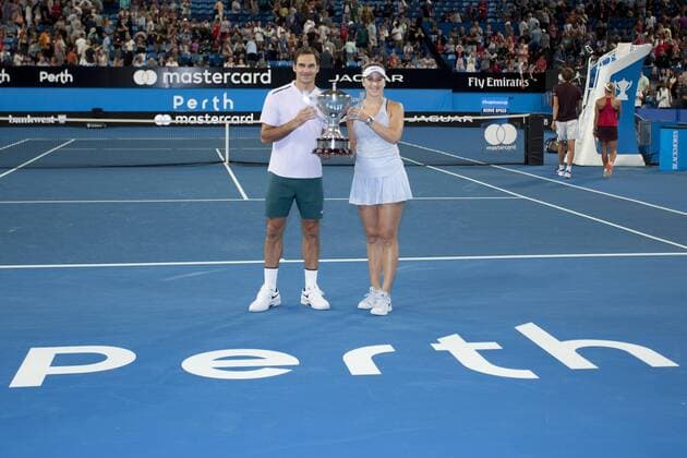6th January 2018, Perth Arena, Perth, Australia; MasterCard Hopman Cup Tennis Final; Winners Roger Federer and Belinda Bencic of Team Switzerland pose with the Hopman Cup after they defeated Germany in the Final  ActionPlus11968643