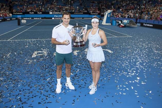 6th January 2018, Perth Arena, Perth, Australia; MasterCard Hopman Cup Tennis Final; Winners Roger Federer and Belinda Bencic of Team Switzerland pose with the Hopman Cup after they defeated Germany in the Final  ActionPlus11968650