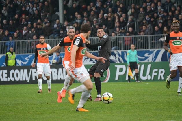 Jimmy Cabot (Lorient), Angelo Fulgini (Angers) FOOTBALL : Angers SCO vs FC Lorient - Coupe de France - 07 01 2018 RonanHoussin Panoramic 