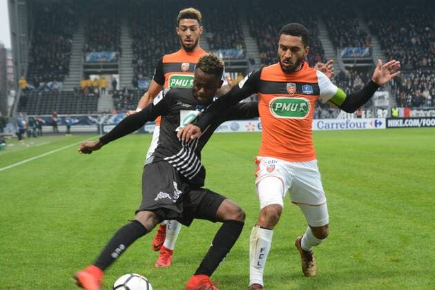 Gilles Sunu (Angers), Sylvain Marveaux (Lorient) FOOTBALL : Angers SCO vs FC Lorient - Coupe de France - 07 01 2018 RonanHoussin Panoramic 