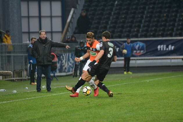 Denis Boulanga (Lorient), Vincent Manceau (Angers) FOOTBALL : Angers SCO vs FC Lorient - Coupe de France - 07 01 2018 RonanHoussin Panoramic 