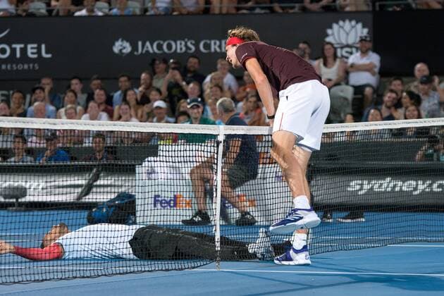 SYDNEY, NSW - JANUARY 8: Alexander Zverev (GER) accidentally hits Nick Kyrgios (AUS) with his raquet at the FAST4 Tennis Showdown doubles game between Grigor Dimitrov (BUL) and Alexander Zverev (GER) versus Lleyton Hewitt (AUS) and Nick Kyrgios (AUS) on Ken Rosewall Arena at The Sydney Tennis Centre in Sydney on January 08, 2018. (Photo by Steven Markham Icon Sportswire) TENNIS: JAN 08 The FAST4 Tennis Tournament Showdown Icon2018010802364 EDITORIAL USE ONLY