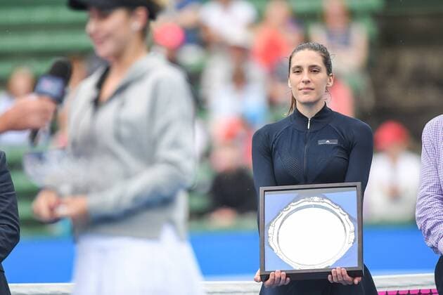 12th January 2018, Kooyong Lawn Tennis Club, Kooyong, Melbourne, Australia; Priceline Pharmacy Kooyong Classic tennis tournament; Andrea Petkovic of Germany looks on as Belinda Bencic of Switzerland is presented with her winners trophy after the Women s final of the Kooyong Classic  ActionPlus11971037