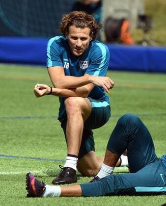 Uruguayan football player Diego Forlan takes part in the first training session at the Kitchee training centre after joining the Kitchee SC of the Hong Kong Premier League in Hong Kong, China, 13 January 2018. Diego Forlan encircled by crowds of fans at the Kitchee training centre  pbu738702_04