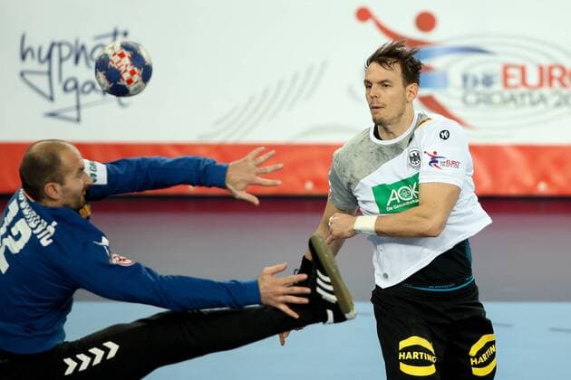 HANDBALL - EHF EURO 2018, GER vs MNE ZAGREB,CROATIA,13.JAN.18 - HANDBALL - EHF European Championship EM Europameisterschaft group stage, Germany vs Montenegro. Image shows Mile Mijuskovic (MNE) and Kai Hafner (GER). GEPAxpictures xMaticxKlansek