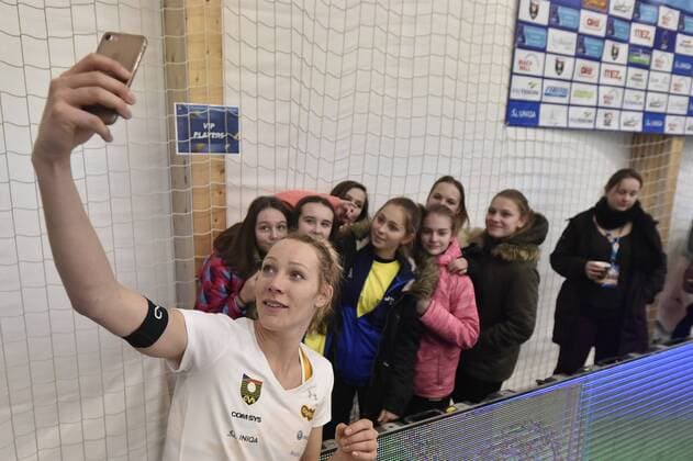 Czech Michala Kvapilova takes a selfie photo with fans after winning the women Beach volleyball Beachvolleyball CEV European Championship EM Europameisterschaft Tour Masters final match Kolocova and Kvapilova vs Tina Graudina and Anastasia Kravchenko of Latvia in Pelhrimov, Czech Republic, Sunday, January 14, 2018. (CTKxPhoto LubosxPavlicek) CTKPhotoP201801140498301  _PAV0698
