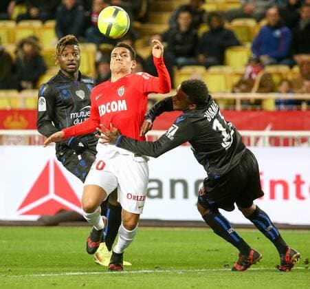 (180117) -- FONTVIEILLE, Jan. 17, 2018 -- Rony Lopez (C) of Monaco competes with Allan Saint-Maximin (L) and Patrik Burner (R) of Nice during the match between Monaco and Nice at the French Ligue 1 2017-2018 season 21st round in Fontvieille, Monaco on Jan. 16, 2018. Monaco tied Nice 2-2. ) (SP)MONACO-FONTVIEILLE-FOOTBALL-FRENCH LIGUE 1-MONACO VS NICE SergexHaouzi 