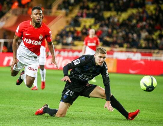 (180117) -- FONTVIEILLE, Jan. 17, 2018 -- Thomas Lemar (L) from Monaco vies with Maxime Le Marchand from Nice during the match between Monaco and Nice at the French Ligue 1 2017-2018 season 21st round in Fontvieille, Monaco on Jan. 16, 2018. Monaco tied Nice 2-2. ) (SP)MONACO-FONTVIEILLE-FOOTBALL-FRENCH LIGUE 1-MONACO VS NICE SergexHaouzi 