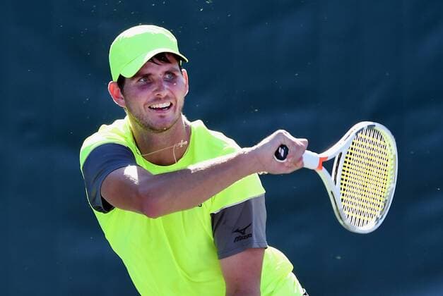NEWPORT BEACH, CA - JANUARY 23: Dennis Novikov (USA) in action in the third set of a match against Kei Nishikori (JPN) during the Oracle Challenger Series tennis tournament played on January 23, 2018 at the Newport Beach Tennis Club in Newport Beach, CA. (Photo by John Cordes Icon Sportswire)