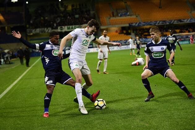 Alois Confais OBIANG Johann (Troyes) vs Ole Selnas (ASSE) FOOTBALL : Troyes vs St Etienne - 1 16 finale coupe de France - 24 01 2018 JBAutissier Panoramic 