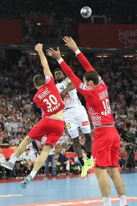 24th January 2018, Arena Zagreb, Zagreb, Croatia; 2018 European Mens Handball Championship, Croatia versus France; Dika Nem (France) defended by Marko Mamic and Jakov Gojun (Ser)  ActionPlus11976895