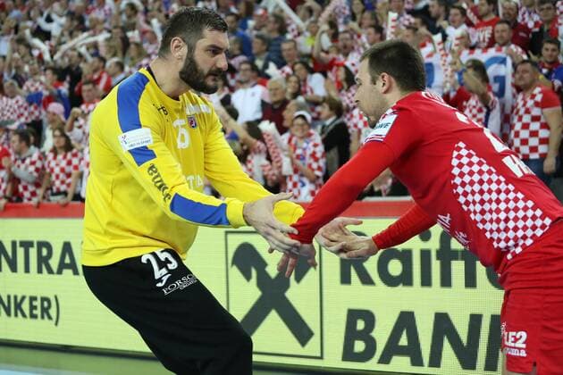 24th January 2018, Arena Zagreb, Zagreb, Croatia; 2018 European Mens Handball Championship, Croatia versus France; Ivan Cupic and Miko Alilovic (Ser) low five each other  ActionPlus11976900