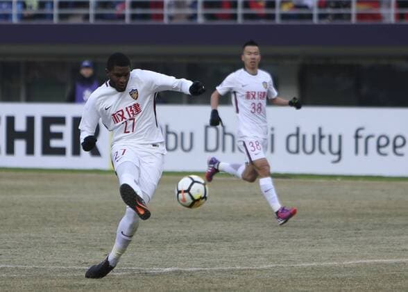 (180131) -- TIANJIN, Jan. 31, 2018 -- Anthony Modeste (L) of China s Tianjin Quanjian FC shoots during the AFC Champions League qualification match between China s Tianjin Quanjian FC and Phillipines Ceres Negros FC in Tianjin, north China, Jan. 30, 2018. Tianjin Quanjian won 2-0. ) (SP)CHINA-TIANJIN-SOCCER-AFC CHAMPIONS LEAGUE-QUALIFICATION-TIA VS CER(CN) ZhangxYudong 