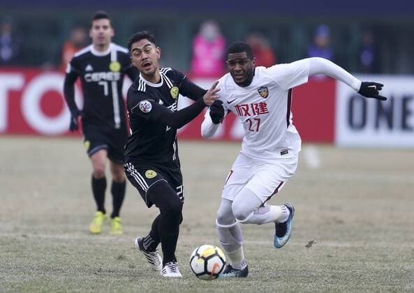 (180131) -- TIANJIN, Jan. 31, 2018 -- Anthony Modeste (R) of China s Tianjin Quanjian FC vies with Omid Nazari of Phillipines Ceres Negros FC during their AFC Champions League qualification match in Tianjin, north China, Jan. 30, 2018. Tianjin Quanjian won 2-0. ) (SP)CHINA-TIANJIN-SOCCER-AFC CHAMPIONS LEAGUE-QUALIFICATION-TIA VS CER(CN) ZhangxYudong 