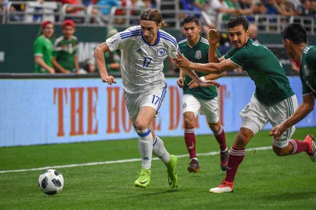 SAN ANTONIO, TX - JANUARY 31: Bosnia and Herzegovina forward Mersudin Ahmetovic (17) chases a loose ball to the corner as Bosnia and Herzegovina midfielder Marijan Carar (3) defends during the soccer match between Mexico and Bosnia & Herzegovina on January 31, 2018 at the Alamodome in San Antonio, Texas. (Photo by Ken Murray Icon Sportswire) SOCCER: JAN 31 Mexico v Bosnia & Herzegovina Icon180131006 EDITORIAL USE ONLY