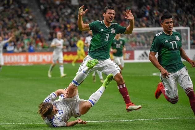 SAN ANTONIO, TX - JANUARY 31: Bosnia and Herzegovina forward Mersudin Ahmetovic (17) is pulled down by Mexico defender Oswaldo Aanis (3) during the soccer match between Mexico and Bosnia & Herzegovina on January 31, 2018 at the Alamodome in San Antonio, Texas. (Photo by Ken Murray Icon Sportswire) SOCCER: JAN 31 Mexico v Bosnia & Herzegovina Icon180131008 EDITORIAL USE ONLY