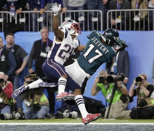Philadelphia Eagles wide receiver Alshon Jeffery (17) with the 34 yard touchdown catch with New England Patriots cornerback Eric Rowe (25) is defending in the first quarter of the Super Bowl LII at U.S. Bank Stadium in Minneapolis, Minnesota on February 4, 2018. The Eagles will be seeking their first title while the Patriots will be after their sixth Super Bowl win.  SBP20180204013 JOHNxANGELILLO