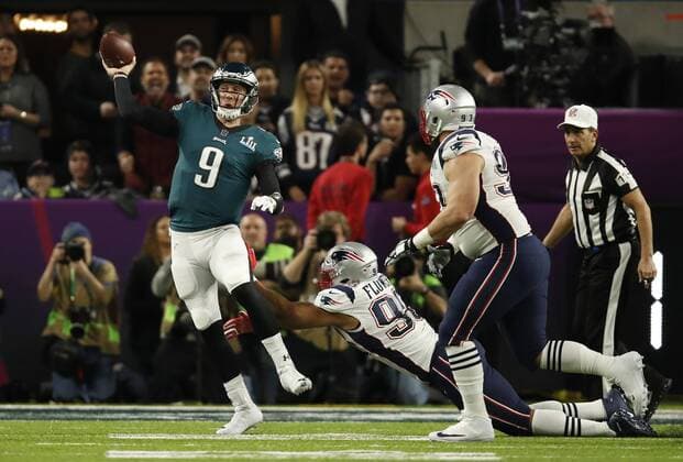 February 4, 2018 - Minneapolis, MN, U.S.A - Philadelphia Eagles quarterback Nick Foles (9) got a pass away under pressure from New England Patriots defenders Trey Flowers (98) and Lawrence Guy (93) in the first half of Super Bowl LII..... ¢ Jerry.Holt@startribune.com ....The New England Patriots met the Philadelphia Eagles in Super Bowl LII Sunday evening, February 4, 2017 at U.S. Bank Stadium in Minneapolis. Minneapolis News - February 4, 2018 - ZUMAm42_ 81801983st Copyright: xJerryxHoltx