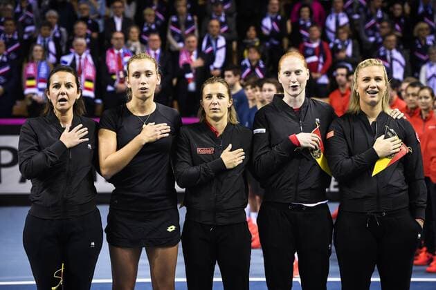 Belgium s coach Dominique Monami, Belgian Elise Mertens, Belgian Kirsten Flipkens, Belgian Alison Van Uytvanck and Belgian Ysaline Bonaventure pictured at the nathionla anthem at the presentation ahead of the first game of this weekend s Fed Cup World Group Round 1 meeting between France and Belgium in La Roche-sur-Yon, France, Saturday 10 February 2018. LAURIExDIEFFEMBACQ  x05293529x