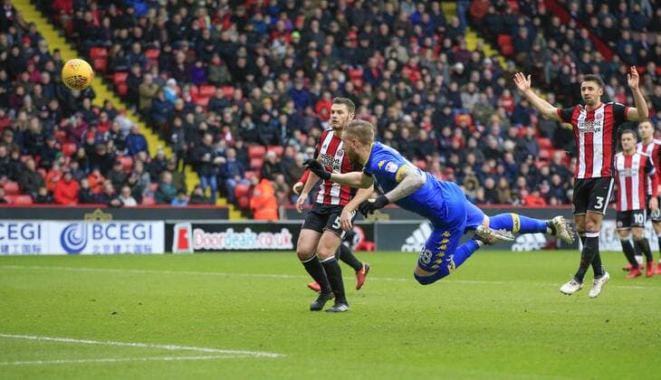 10th February 2018, Bramall Lane, Sheffield, England; EFL Championship football, Sheffield United versus Leeds United; Pontus Jansson of Leeds United aims a diving header at goal but it goes wide  ActionPlus11983977