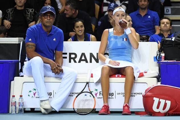 Kristina Mladenovic (FRA) Yannick Noah (FRA) TENNIS : Fed Cup - FRA vs BEL - 10 02 18 VirginieBouyer Panoramic 