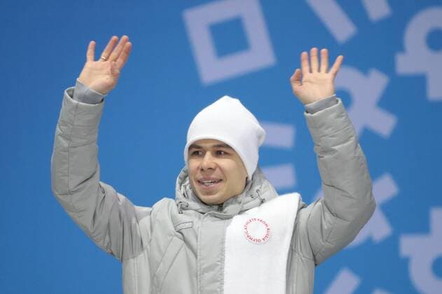 PYEONGCHANG, SOUTH KOREA â€“ FEBRUARY 11, 2018: Bronze medallist Semyon Yelistratov, Olympic Athlete from Russia, poses at the victory ceremony for the for men s 1500m short track Speed skating Eisschnelllauf event at the 2018 Winter Olympic Games Olympische Spiele Olympia OS at Medals Plaza. Sergei Bobylev TASS  TS0734B3