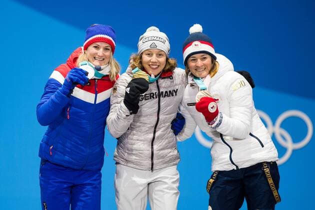 Themen der Woche - SPORT PyeongChang 2018, Biathlon, 7,5km Sprint Damen, Siegerehrung, Laura Dahlmeier bekommt ihre Goldmedaille 180211 Marte Olsbu of Norway, Silver, Laura Dahlmeier of Germany, Gold, and Veronika Vitkova of Czech Republic, Bronze, at the medal ceremony for the Women s Skiathlon during day two of the 2018 Winter Olympics on February 11, 2018 in Pyeongchang. Photo: Jon Olav Nesvold BILDBYRAN kod JE 160153 *** 180211 Marte Olsbu of Norway Silver Laura Dahlmeier of Germany Gold and Veronika Vitkova of Czech Republic Bronze at the medal ceremony for the Women s 4 X 5 km relay during day two of the 2018 Winter Olympics on February 11 2018 in Pyeongchang Photo Jon Olav Nesvold BILDBYRAN code JE 160153  Copyright: JONxOLAVxNESVOLD BB180211BB202