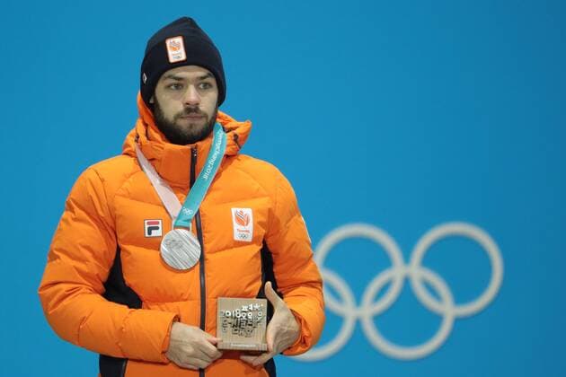 PYEONGCHANG, SOUTH KOREA â€“ FEBRUARY 11, 2018: Short track speed skater Sjinkie Knegt of the Netherlands poses with his silver medal at the victory ceremony for the for men s 1500m short track Speed skating Eisschnelllauf event at the 2018 Winter Olympic Games Olympische Spiele Olympia OS at Medals Plaza. Sergei Bobylev TASS  TS0734B5