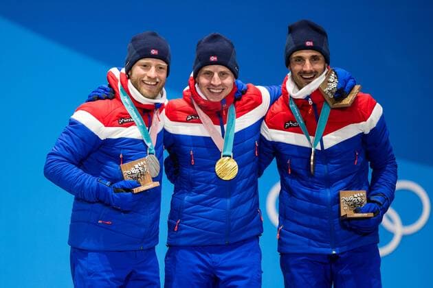 PyeongChang 2018, Skiathlon Herren, Siegerehrung 180211 Martin Johnsrud Sundby, Silver, Simen Hegstad Krüger, Gold and Hans Christer Holund, Bronze, of Norway, celebrates at the medal ceremony for the Men s Skiathlon during day two of the 2018 Winter Olympics on February 11, 2018 in Pyeongchang. Photo: Jon Olav Nesvold BILDBYRAN kod JE 160153 Copyright: JONxOLAVxNESVOLD BB180211BB207