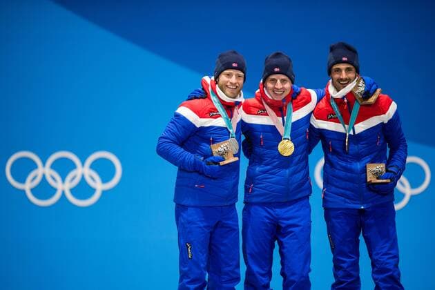 PyeongChang 2018, Skiathlon Herren, Siegerehrung 180211 Martin Johnsrud Sundby, Silver, Simen Hegstad Krüger, Gold and Hans Christer Holund, Bronze, of Norway, celebrates at the medal ceremony for the Men s Skiathlon during day two of the 2018 Winter Olympics on February 11, 2018 in Pyeongchang. Photo: Jon Olav Nesvold BILDBYRAN kod JE 160153 Copyright: JONxOLAVxNESVOLD BB180211BB208