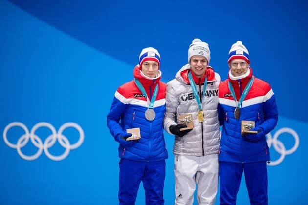 180211 Johann Andre Forfang of Norway, Silver, Andreas Wellinger of Germany, gold, and Robert Johansson of Norway, Bronze, at the medal ceremony for the Men s Ski jumping Skispringen Ski nordisch Normal Hill Individual during day two of the 2018 Winter Olympics on February 11, 2018 in Pyeongchang. Photo: Jon Olav Nesvold BILDBYRN kod JE 160153 Copyright: JONxOLAVxNESVOLD BB180211BB516