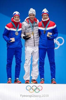 180211 Johann Andre Forfang of Norway, Silver, Andreas Wellinger of Germany, gold, and Robert Johansson of Norway, Bronze, at the medal ceremony for the Men s Ski jumping Skispringen Ski nordisch Normal Hill Individual during day two of the 2018 Winter Olympics on February 11, 2018 in Pyeongchang. Photo: Jon Olav Nesvold BILDBYRN kod JE 160153 Copyright: JONxOLAVxNESVOLD BB180211BB520