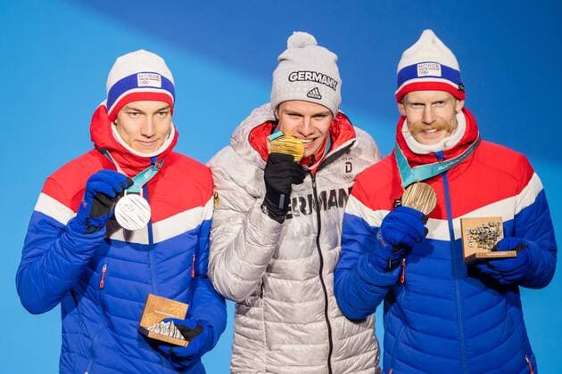 180211 Johann Andre Forfang of Norway, Silver, Andreas Wellinger of Germany, gold, and Robert Johansson of Norway, Bronze, at the medal ceremony for the Men s Ski jumping Skispringen Ski nordisch Normal Hill Individual during day two of the 2018 Winter Olympics on February 11, 2018 in Pyeongchang. Photo: Jon Olav Nesvold BILDBYRN kod JE 160153 Copyright: JONxOLAVxNESVOLD BB180211BB522