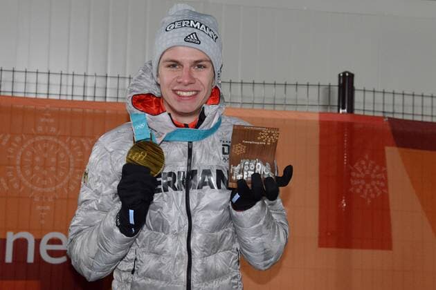 February 11, 2018 - Pyeongchang, South Korea - ANDREAS WELLINGER of Germany poses with his gold medal from theMen s Normal Hill Individual skii jumping event in the PyeongChang Olympic Games Olympische Spiele Olympia OS PyeongChang 18: Ski jumping Skispringen Ski nordisch Men - ZUMAl132 20180211_zap_l132_048 Copyright: xChristopherxLevyx