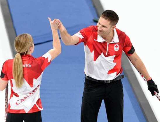 (180212) -- PYEONGCHANG, Feb. 12, 2018 -- Canada s Kaitlyn Lawes (L) and John Morris celebrate after winning the curling mixed doubles semifinal against Kristin Skaslien and Magnus Nedregotten from Norway at the 2018 PyeongChang Winter Olympic Games Olympische Spiele Olympia OS at the Gangneung Curling Centre in Gangneung, South Korea, on Feb. 12, 2018. Canada won 8-4. ) (SP)OLY-SOUTH KOREA-PYEONGCHANG-CURLING-MIXED DOUBLES-CAN VS NOR MaxPing 