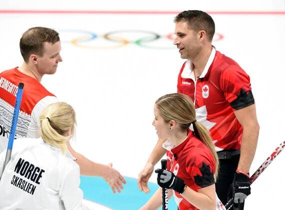(180212) -- PYEONGCHANG, Feb. 12, 2018 -- Canada s Kaitlyn Lawes (R, Front) and John Morris (R, Back) shake hands with competitors after winning the curling mixed doubles semifinal against Kristin Skaslien and Magnus Nedregotten from Norway at the 2018 PyeongChang Winter Olympic Games Olympische Spiele Olympia OS at the Gangneung Curling Centre in Gangneung, South Korea, on Feb. 12, 2018. Canada won 8-4. ) (SP)OLY-SOUTH KOREA-PYEONGCHANG-CURLING-MIXED DOUBLES-CAN VS NOR MaxPing 