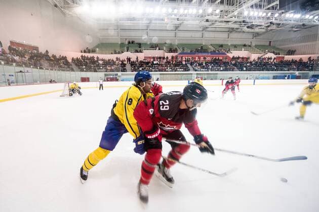 180212 Johan Fransson of Sweden in action with Rob Klinkhammer of Canada during the Men s Ice hockey Eishockey International Friendly Länderspiel match between Sweden and Canada during day three of the 2018 Winter Olympics on February 12, 2018 in Incheon. Photo: Petter Arvidson BILDBYRAN kod PA 91961 Copyright: PETTERxARVIDSON BB180212PA058