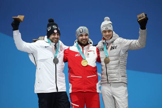 OLYMPICS - 2018 Winter Olympics PYEONGCHANG,SOUTH KOREA,12.FEB.18 - OLYMPICS, LUGE - Olympic Winter games Winterspiele Spiele Summer games PyeongChang 2018, Medals Plaza, men, award ceremony. Image shows Chris Mazdzer (USA), David Gleirscher (AUT) and Johannes Ludwig (GER). Keywords: medals. GEPAxpictures xMaticxKlansek