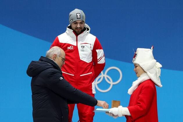 OLYMPICS - 2018 Winter Olympics PYEONGCHANG,SOUTH KOREA,12.FEB.18 - OLYMPICS, LUGE - Olympic Winter games Winterspiele Spiele Summer games PyeongChang 2018, Medals Plaza, men, award ceremony. Image shows David Gleirscher (AUT) and president Karl Stoss (OEOC). Keywords: medal. GEPAxpictures xMaticxKlansek