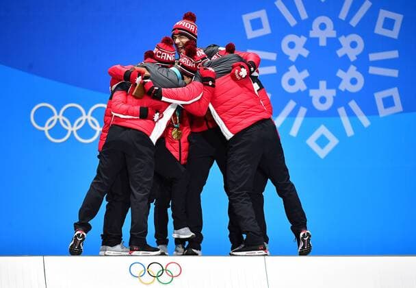 Members of the Canada Figure skating Eiskunstlauf Ice Dance Team celebrate as they are awarded their gold medals during their medal ceremony during the Pyeongchang 2018 Winter Olympics, in Pyeongchang, South Korea, on February 12, 2018.  OLY20180212329 KEVINxDIETSCH