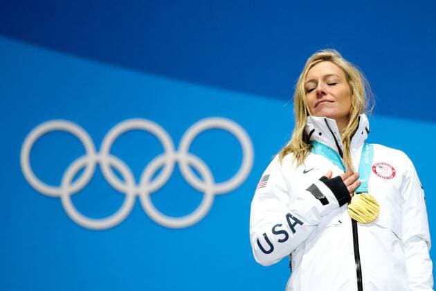 Themen der Woche - SPORT Bilder des Tages - SPORT OLYMPICS - 2018 Winter Olympics PYEONGCHANG,SOUTH KOREA,12.FEB.18 - OLYMPICS, SNOWBOARDING - Olympic Winter games Winterspiele Spiele Summer games PyeongChang 2018, Medals Plaza, Slopestyle, ladies, award ceremony. Image shows Jamie Anderson (USA). Keywords: medal. GEPAxpictures xMaticxKlansek