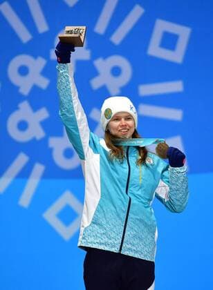 Bronze medalist Kazakstan s Yulia Galysheva celebrates during the medal ceremony for Ladies Moguls during the Pyeongchang 2018 Winter Olympics in Pyeongchang, South Korea, on February 12, 2018.  OLY20180212351 KEVINxDIETSCH
