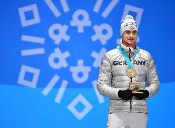 Bronze medalist Germany s Johannes Ludwig celebrates during the medal ceremony for Men s Luge during the Pyeongchang 2018 Winter Olympics in Pyeongchang, South Korea, on February 12, 2018.  OLY20180212366 KEVINxDIETSCH