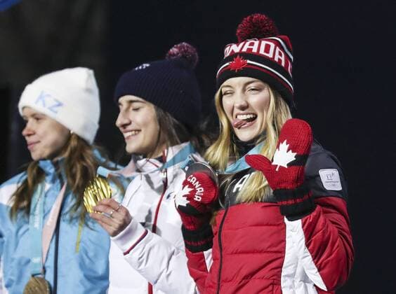 (180212) -- PYEONGCHANG, Feb. 12, 2018 -- Second-placed Justine Dufour-Lapointe from Canada (R) reacts on the podium during medal ceremony for ladies moguls event of freestyle skiing at 2018 PyeongChang Winter Olympic Games Olympische Spiele Olympia OS at the Medal Plaza in PyeongChang, South Korea, on Feb. 12, 2018. ) (SP)OLY-SOUTH KOREA-PYEONGCHANG-FREE STYLE SKIING-LADIES MOGULS-MEDAL CEREMONY WuxZhuang 