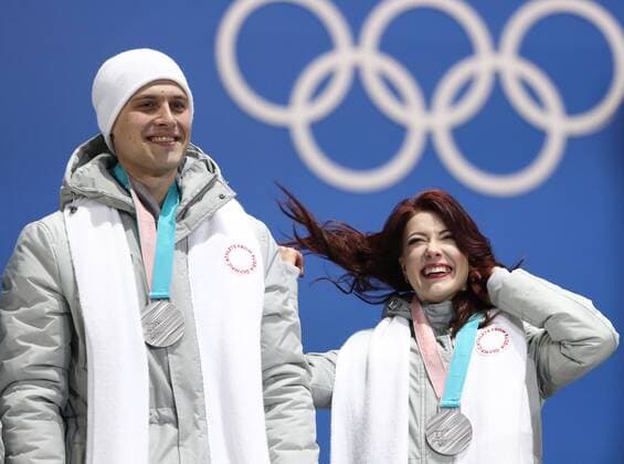 PYEONGCHANG, SOUTH KOREA â€“ FEBRUARY 12, 2018: Olympic Athletes from Russia Ekaterina Bobrova and Alexander Enbert pose with their silver medals during the victory ceremony for the Figure skating Eiskunstlauf team event at the 2018 Winter Olympic Games Olympische Spiele Olympia OS Valery Sharifulin TASS  TS0737C7
