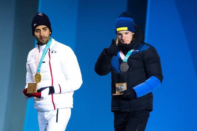 180213 Martin Fourcade of France, Gold, and Sebastian Samuelsson of Sweden, silver, at the medal ceremony for the Men s Biathlon 12,5 km Pursuit during day four of the 2018 Winter Olympics on February 13, 2018 in Pyeongchang. Photo: Jon Olav Nesvold BILDBYRAN kod JE 160160 Copyright: JONxOLAVxNESVOLD BB180213JE094
