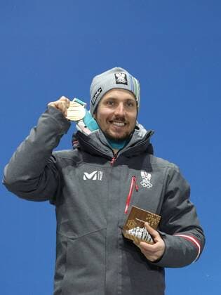 OLYMPICS - 2018 Winter Olympics PYEONGCHANG,SOUTH KOREA.13.FEB.18 - OLYMPICS,ALPINE SKIING - Olympic Winter games Winterspiele Spiele Summer games PyeongChang 2018, alpine combined, men, award ceremony. Image shows Marcel Hirscher (AUT). Keywords: medal. GEPAxpictures xMaticxKlansek