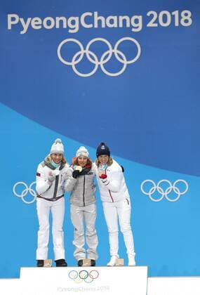 Themen der Woche - SPORT (180213) -- PYEONGCHANG, Feb. 13, 2018 -- Champion Laura Dahlmeier (C) from Germany, second-placed Anastasiya Kuzmina (L) from Slovakia and third-placed Anais Bescond from France pose for photos during the medal ceremony of women s 10km pursuit event of biathlon at the 2018 PyeongChang Winter Olympic Games Olympische Spiele Olympia OS at the Medal Plaza in PyeongChang, South Korea, on Feb. 13, 2018. ) (SP)OLY-SOUTH KOREA-PYEONGCHANG-BIATHLON-WOMEN S 10KM PERSUIT-MEDAL CEREMONY BaixXuefei 