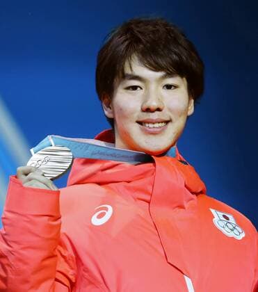Pyeongchang Olympics Daichi Hara of Japan poses with his freestyle skiing moguls bronze medal at the Pyeongchang Winter Olympics in South Korea on Feb. 13, 2018. 