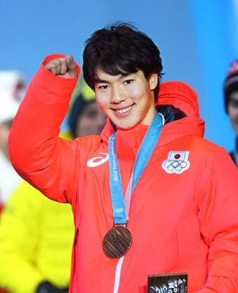 Pyeongchang Olympics Daichi Hara of Japan poses with his freestyle skiing moguls bronze medal at the Pyeongchang Winter Olympics in South Korea on Feb. 13, 2018. 